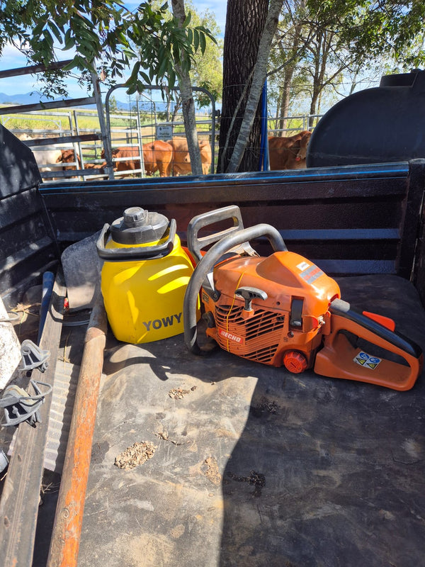Customer photo: yellow 3L Yowy next to a chainsaw on a ute tray